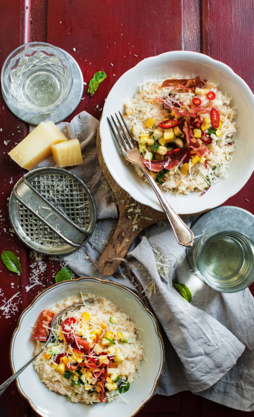 Mangoldrisotto mit gebratenen Zucchiniwürfeln und Pancetta